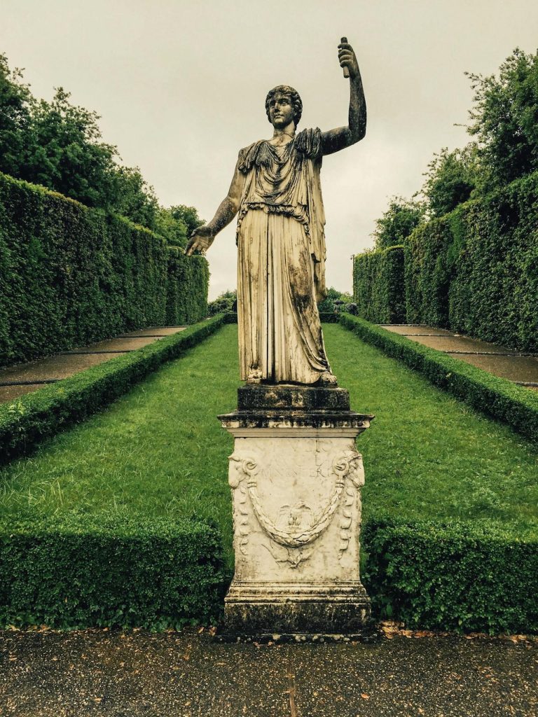 marble statue in a garden